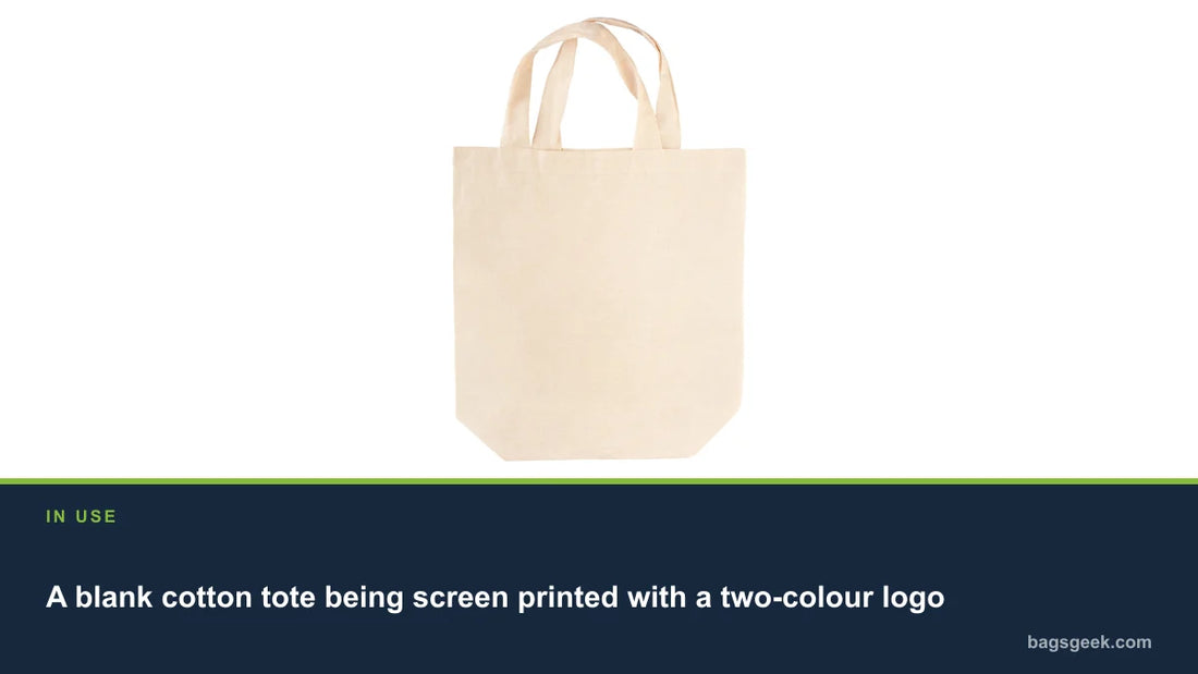A blank cotton tote being screen printed with a two-colour logo