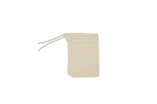 Natural cotton single drawstring bags stacked for a bulk order