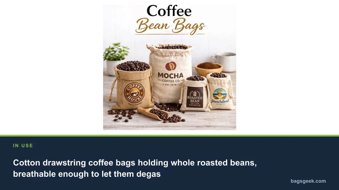 Cotton drawstring coffee bags holding whole roasted beans, breathable enough to let them degas